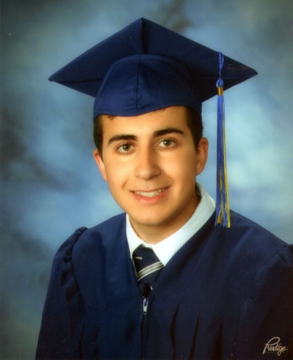 Eriks-SJP-senior-cap-and-gown-picture919-600x737-1.jpg